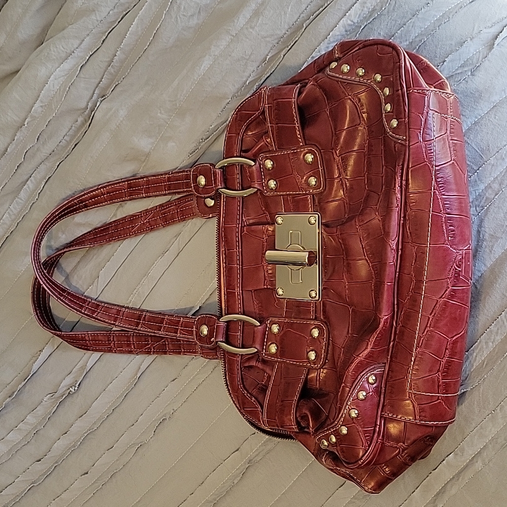 Kathy Van Zeeland red purse